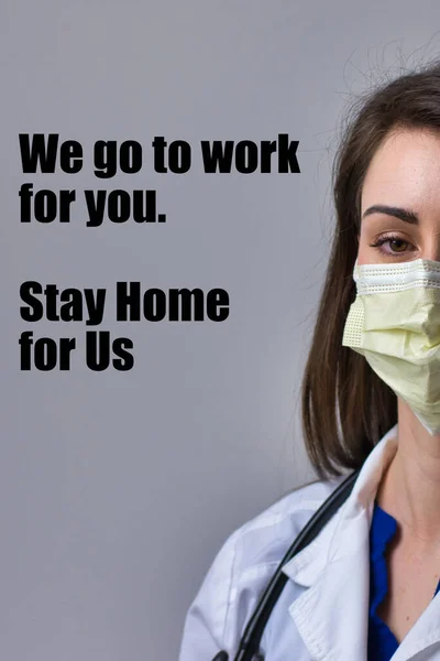 We go to work motivation and inspiration- Female medical professional with mask on grey background