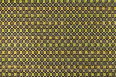 Geometrik desenleri ile koyu kahverengi, yeşil, sarı arka plan