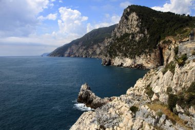 Portovenere ( SP ), Italy - April 15, 2017: Cliff around San Pietro Church, Portovenere gulf of Poets, Cinque Terre, La Spezia, Liguria, Italy