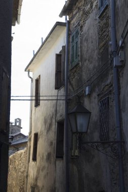 Triora (IM), Italy - February 15, 2017: Old houses in The witches village of Triora, Imperia, Liguria, Italy. 