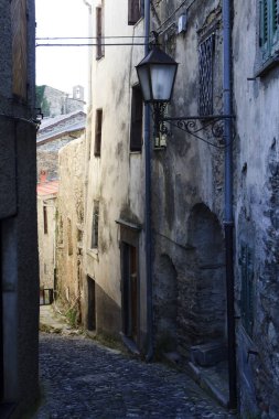 Triora (IM), Italy - February 15, 2017: Old houses in The witches village of Triora, Imperia, Liguria, Italy. 