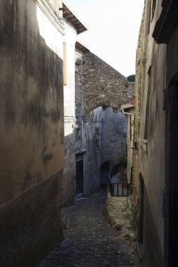 Triora (IM), Italy - February 15, 2017: Old houses in The witches village of Triora, Imperia, Liguria, Italy. 