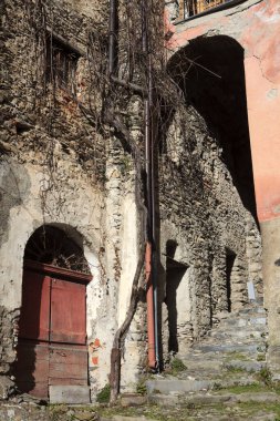 Triora (IM), Italy - February 15, 2017: Old houses details in The witches village of Triora, Imperia, Liguria, Italy. 