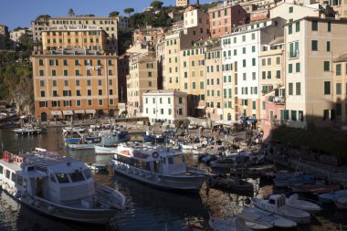 Camogli (GE), Italy - June 01, 2017: Camogli's harbour in the fishing village of Camogli, Gulf of Paradise, Portofino National Park, Genova, Liguria, Italy