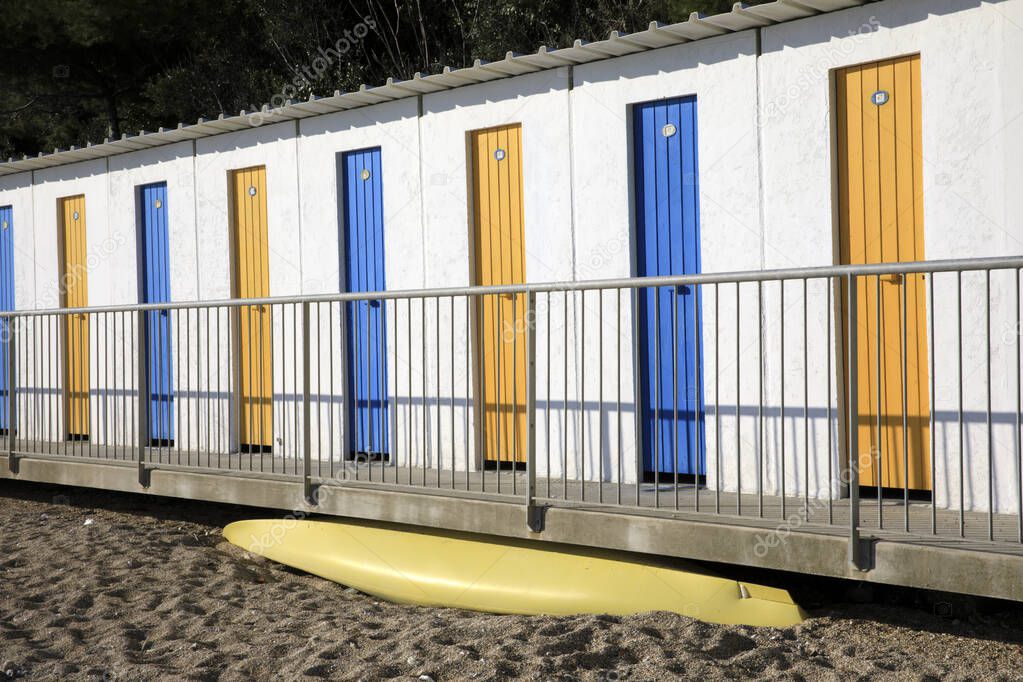 Numana (AN), Italy - January 1, 2019: Colourful cabins at  Numana beach, Riviera del Conero, Adriatic Sea, Numana, Ancona, Marche, Italy 