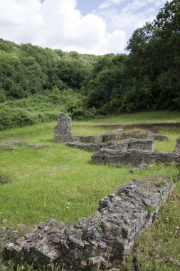 Roselle (GR), Italy - June 19, 2017: Etruscan ruins in archaeological site in Roselle, Grosseto, Tuscany, Italy, Europe