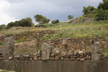 Roselle (GR), Italy - June 19, 2017: Etruscan ruins in archaeological site in Roselle, Grosseto, Tuscany, Italy, Europe