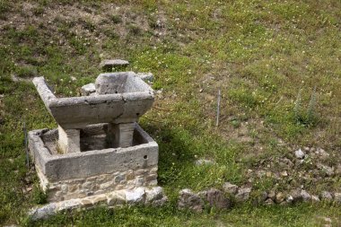 Roselle (GR), Italy - June 19, 2017: Etruscan ruins in archaeological site in Roselle, Grosseto, Tuscany, Italy, Europe