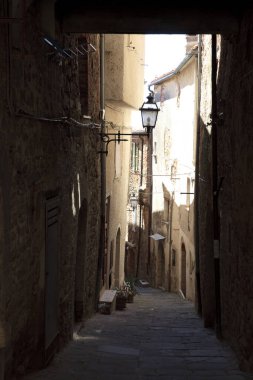 Montemerano (GR), Italy - September 11, 2017: A typical road and houses in Montemerano village, Manciano, Grosseto, Tuscany, Italy, Europe