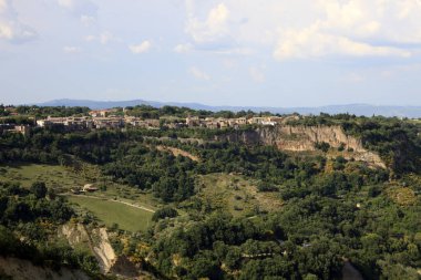 Civita di Bagnoregio (VT), Italy - May 15, 2016: Soft eroded clay landscape around Civita di Bagnoregio, Tuscia, Lazio, Italy