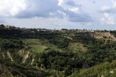 Civita di Bagnoregio (VT), Italy - May 15, 2016: Soft eroded clay landscape around Civita di Bagnoregio, Tuscia, Lazio, Italy