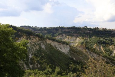 Civita di Bagnoregio (VT), Italy - May 15, 2016: Soft eroded clay landscape around Civita di Bagnoregio, Tuscia, Lazio, Italy