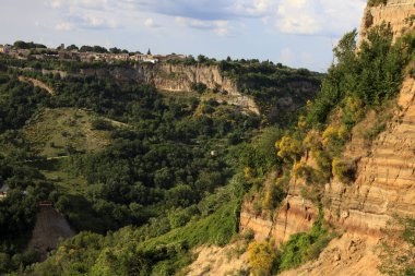 Civita di Bagnoregio (VT), Italy - May 15, 2016: Soft eroded clay landscape around Civita di Bagnoregio, Tuscia, Lazio, Italy