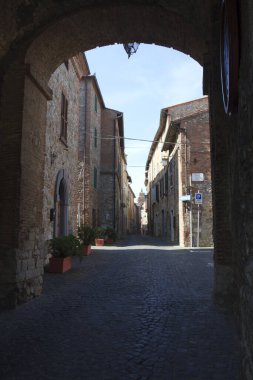 Monteleone d' Orvieto (TR), Italy - May 27, 2016: A road and houses in Monteleone d' Orvieto village, Orvieto, Terni, Umbria, Italy