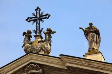 Mantova (MN), Italy - June 10, 2017: Baroque style Carrara marble facade and Gothic bell tower, Cathedral of Saint Peter the Apostle, Piazza Sordello, Mantova, Lombardy, Italy
