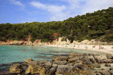 Es Migjorn Gran, Menorca / Spain - June 25, 2016: The Escorxada beach and bay, Es Migjorn Gran, Menorca, Balearic Islands, Spain