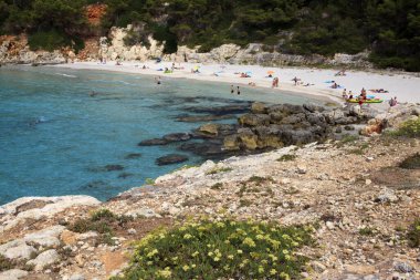 Es Migjorn Gran, Menorca / Spain - June 25, 2016: The Escorxada beach and bay, Es Migjorn Gran, Menorca, Balearic Islands, Spain