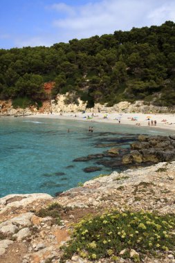 Es Migjorn Gran, Menorca / Spain - June 25, 2016: The Escorxada beach and bay, Es Migjorn Gran, Menorca, Balearic Islands, Spain