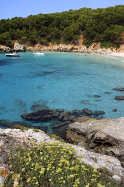 Es Migjorn Gran, Menorca / Spain - June 25, 2016: The Escorxada beach and bay, Es Migjorn Gran, Menorca, Balearic Islands, Spain