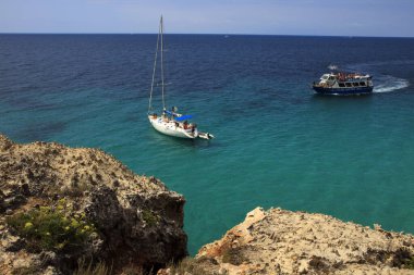 Es Migjorn Gran, Menorca / Spain - June 25, 2016: The Escorxada bay, Es Migjorn Gran, Menorca, Balearic Islands, Spain