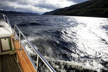 Loch Ness (Scotland), UK - August 02, 2018: Loch Ness lake view from a tourist boat, Scotland, Highlands, United Kingdom