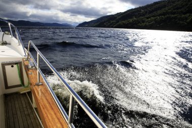 Loch Ness (Scotland), UK - August 02, 2018: Loch Ness lake view from a tourist boat, Scotland, Highlands, United Kingdom