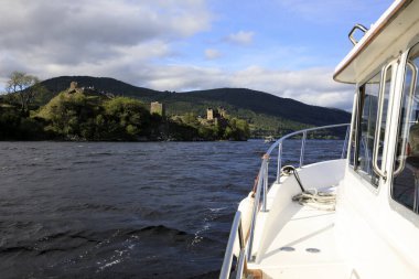 Loch Ness (Scotland), UK - August 02, 2018: Urquhart castle view from a boat, Loch Ness lake, Scotland, Highlands, United Kingdom