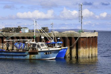 Orkney (Scotland), UK - August 10, 2018: A fishing boat in the port, Orkney, Scotland, Highlands, United Kingdom
