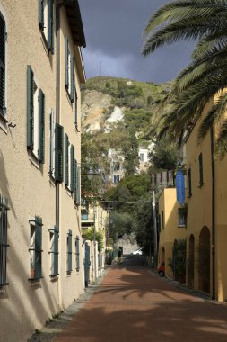 Varigotti (SV), Italy - December 30, 2017: A tipycal road and houses in Varigotti village, Italian Riviera, Savona, Liguria, Italy