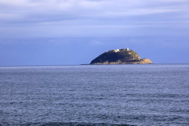 Alassio (SV), Italy - December 12, 2017: Gallinara island view from Alassio, Riviera dei Fiori, Savona, Liguria, Italy.