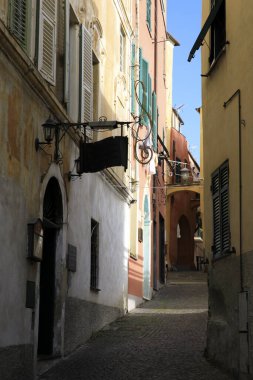 Cervo (IM), Italy - December 30, 2017: A tipycal road and houses in Cervo village, Italian Riviera, Imperia, Liguria, Italy