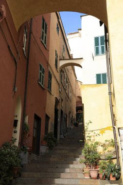 Cervo (IM), Italy - December 30, 2017: A tipycal road and houses in Cervo village, Italian Riviera, Imperia, Liguria, Italy