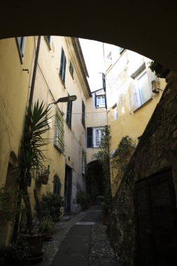 Cervo (IM), Italy - December 30, 2017: A tipycal road and houses in Cervo village, Italian Riviera, Imperia, Liguria, Italy