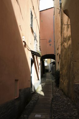 Cervo (IM), Italy - December 30, 2017: A tipycal road and houses in Cervo village, Italian Riviera, Imperia, Liguria, Italy