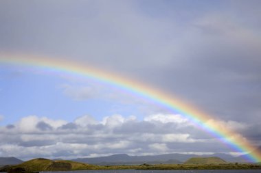 Myvatn / Iceland - August 30, 2017: A spectacular rainbow at lake Myvatn, Iceland, Europe
