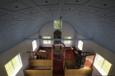 Akureyri / Iceland - August 26, 2017: The wooden church inside in Laufas Folk museum area, Iceland, Europe