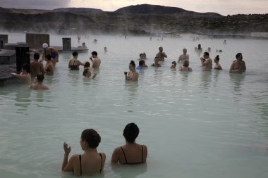 Grindavik / Iceland - August 15, 2017: Tourist relaxing in hot water at blue lagoon, Reykjavik, Iceland, Europe