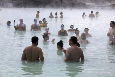 Grindavik / Iceland - August 15, 2017: Tourist relaxing in hot water at blue lagoon, Reykjavik, Iceland, Europe