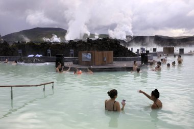 Grindavik / Iceland - August 15, 2017: Tourist relaxing in hot water at blue lagoon, Reykjavik, Iceland, Europe
