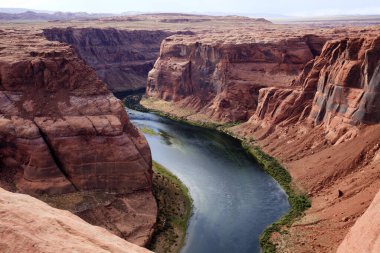 Page, Arizona / USA - August 05, 2015: Horseshoe Bend seen from the lookout point, Colorado river, Page, Arizona, USA