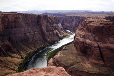 Page, Arizona / USA - August 05, 2015: Horseshoe Bend seen from the lookout point, Colorado river, Page, Arizona, USA
