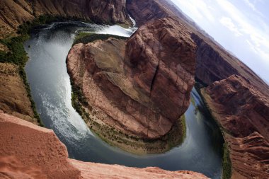 Page, Arizona / USA - August 05, 2015: Horseshoe Bend seen from the lookout point, Colorado river, Page, Arizona, USA