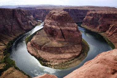 Page, Arizona / USA - August 05, 2015: Horseshoe Bend seen from the lookout point, Colorado river, Page, Arizona, USA