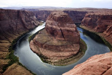 Page, Arizona / USA - August 05, 2015: Horseshoe Bend seen from the lookout point, Colorado river, Page, Arizona, USA