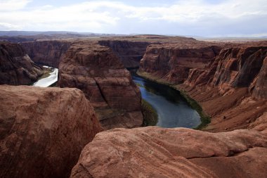 Page, Arizona / USA - August 05, 2015: Horseshoe Bend seen from the lookout point, Colorado river, Page, Arizona, USA