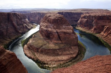 Page, Arizona / USA - August 05, 2015: Horseshoe Bend seen from the lookout point, Colorado river, Page, Arizona, USA