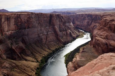 Page, Arizona / USA - August 05, 2015: Horseshoe Bend seen from the lookout point, Colorado river, Page, Arizona, USA