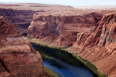 Page, Arizona / USA - August 05, 2015: Horseshoe Bend seen from the lookout point, Colorado river, Page, Arizona, USA
