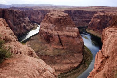 Page, Arizona / USA - August 05, 2015: Horseshoe Bend seen from the lookout point, Colorado river, Page, Arizona, USA