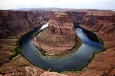 Page, Arizona / USA - August 05, 2015: Horseshoe Bend seen from the lookout point, Colorado river, Page, Arizona, USA